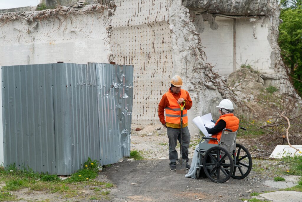 Woman,In,Wheelchair,Works,As,Engineer,At,Construction,Site,Disabled
